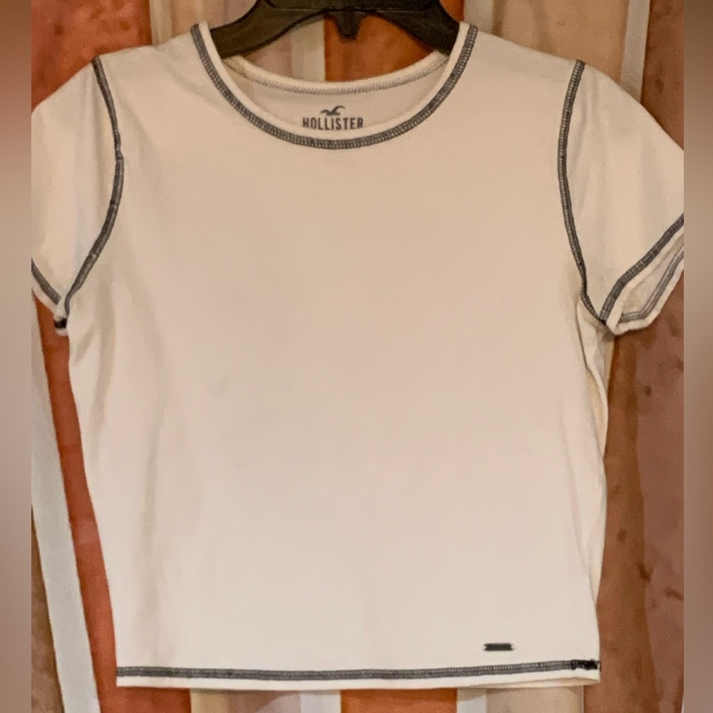 Hollister White Baby Tee with Black Stitching.Size small
